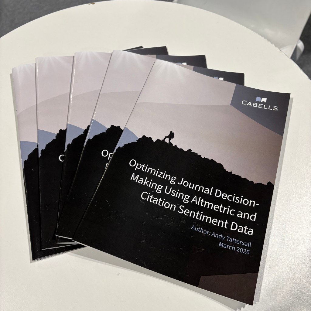 Copies of Cabells latest white paper, Optimizing Journal Decision-making Using Altmetric and Citation Sentiment Data on a white table.
